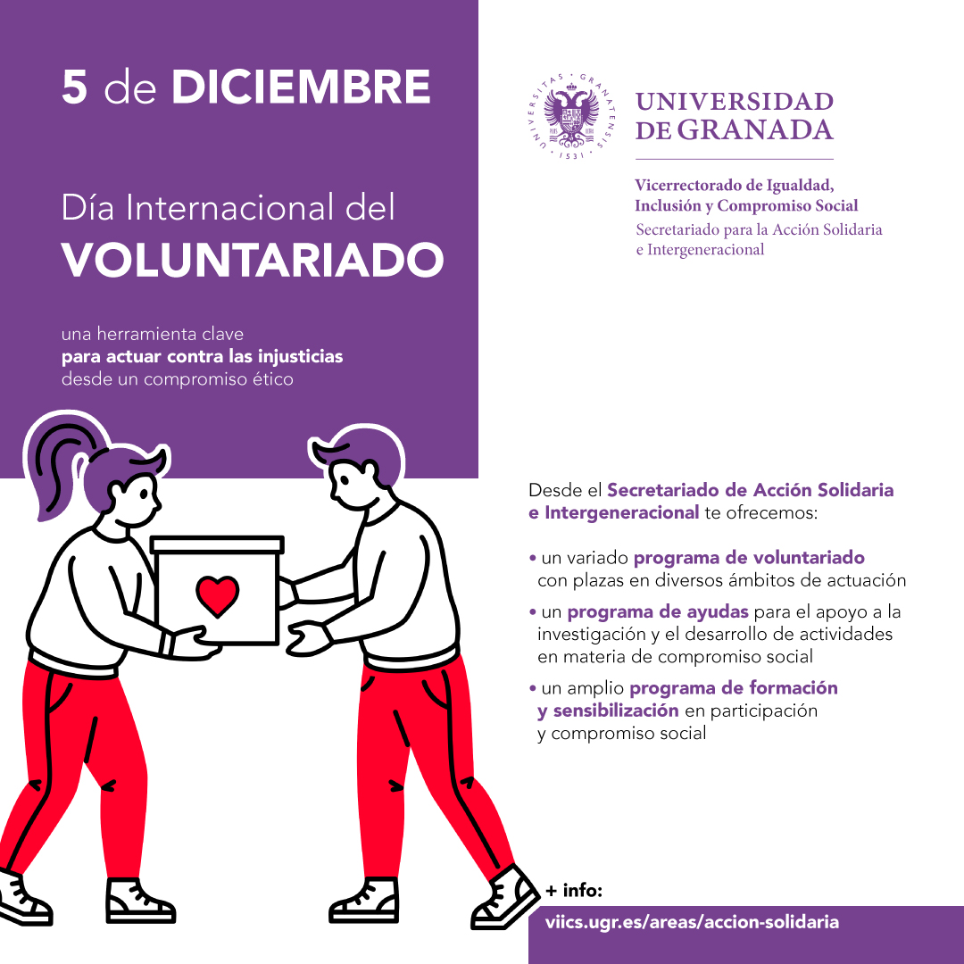 Dos personas voluntaris con una caja